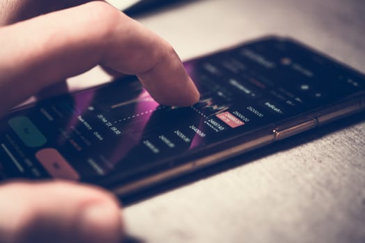 Cryptocurrency Trading Chart on Mobile Screen photo
