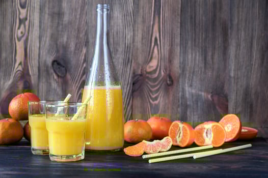 Bottle of orange juice photo