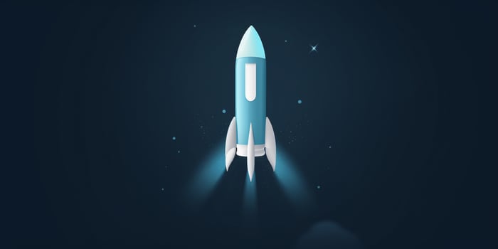 Symbolic 3D Rendering of White Rocket Model against Blue Background for Startup Concepts photo