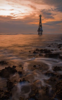 Orange sky at sunset on sindangkerta beach, popular tourist destination cipatujah, tasikmalaya, west java, indonesia photo