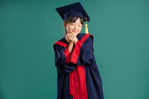 beautiful asian girl posing on blue background photo