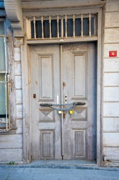 Gray wood and old door with padlocks. photo