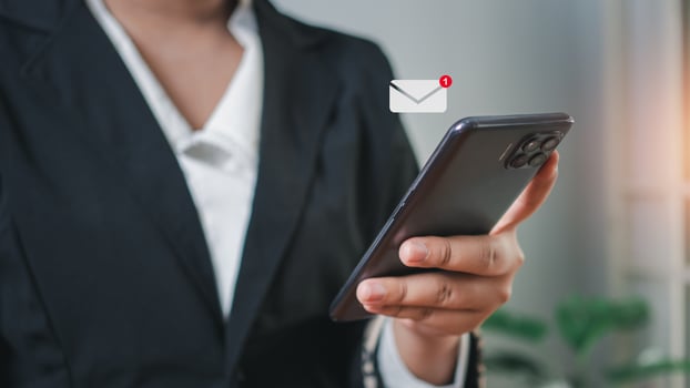 Business woman hand using smartphone  application communication . New email notification concept for business email communication and digital marketing. photo
