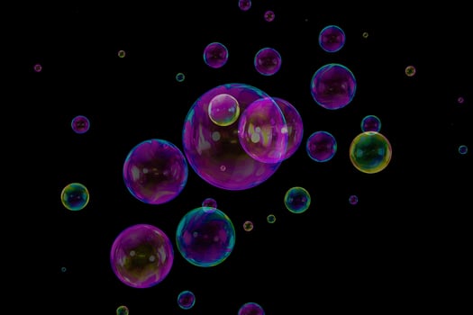 Soap bubbles composition overlay black background photo