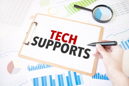 Text tech supports on white paper sheet and marker on businessman hand on the diagram. Business concept photo