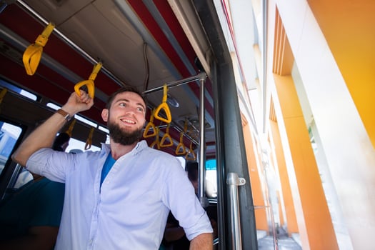 man traveling as passenger of a bus photo