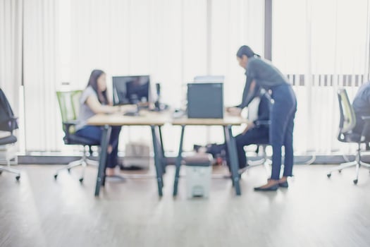 View of office with people working photo
