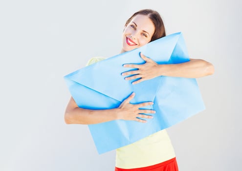 woman receiving big envelope photo