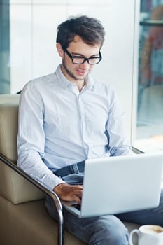 Man working from a cade photo
