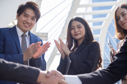 Businessman shaking hands together. Team success concept. photo