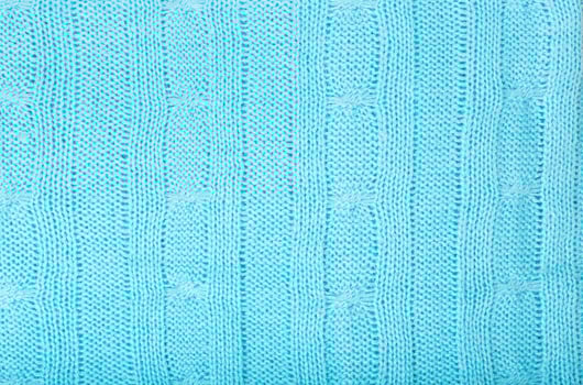 Light blue knitted surface. Background photo