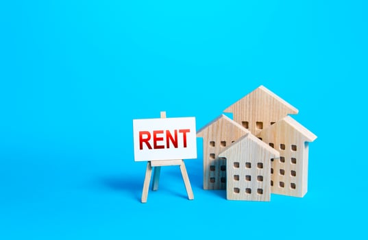Residential buildings and sign for rent. Real estate realtor services. photo
