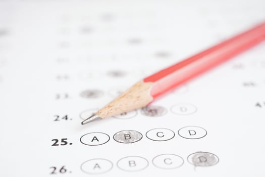 Answer sheets with pencil drawing fill to select choice, education concept. photo