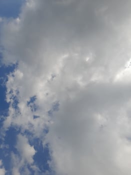 The white clouds on the blue sky are perfect for the background.  Skyscape on Lombok Island, Indonesia photo