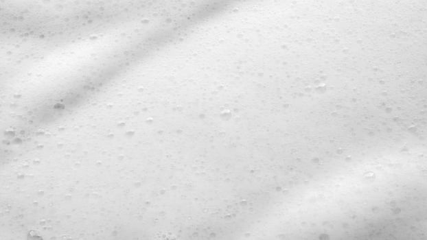 Abstract white soap foam bubbles texture background photo