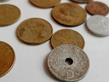 many ancient coins isolated from Indonesia. Rupiah currency photo