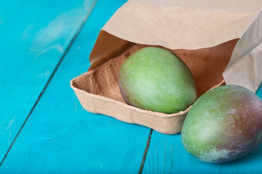 Mango fruit in a paper bag photo