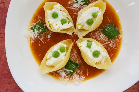 Italian pasta with ricotta cheese,green peas,and salsa photo