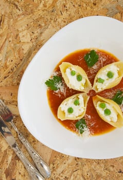 Italian pasta with ricotta cheese,green peas,and salsa photo