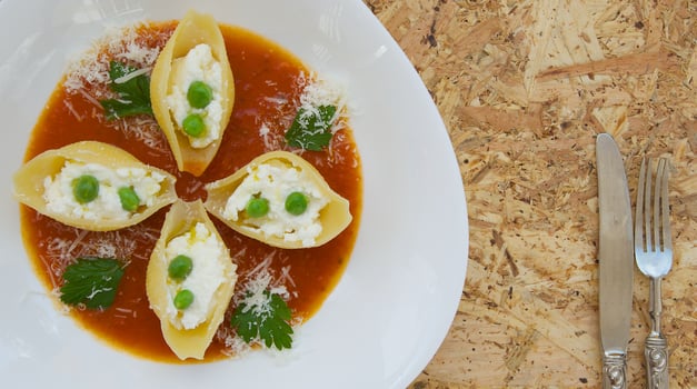 Italian pasta with ricotta cheese,green peas,and salsa photo