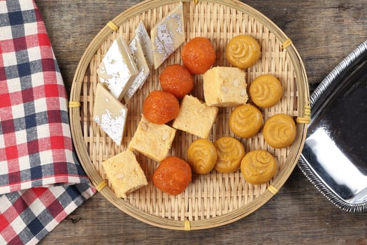 Laddu laddoo motichoor bundi  Soan papdi papri shonpapri Sandesh shondesh traditional Bengali sweets photo
