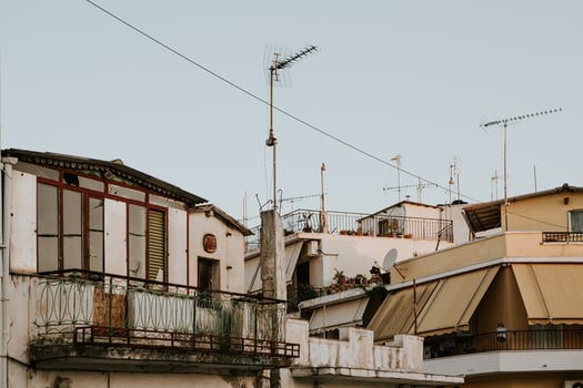 The beauty of complexity of roofs of the Greek town Zakynthos on the Zakynthos island with clear blue sky in background during the sunrise photo