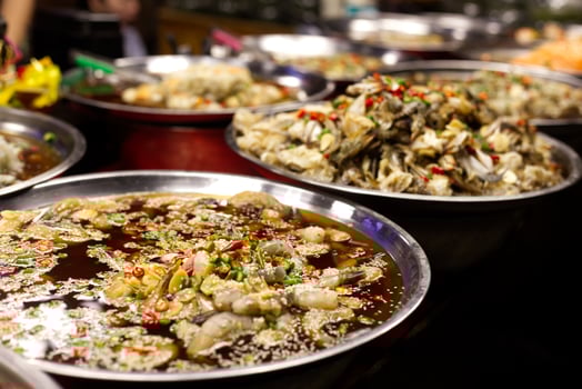 thai spicy pickled crab salad sell in thai street market photo