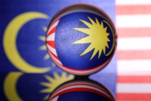 Malaysian flag refraction through glass crystal ball country independence patriot concept photo