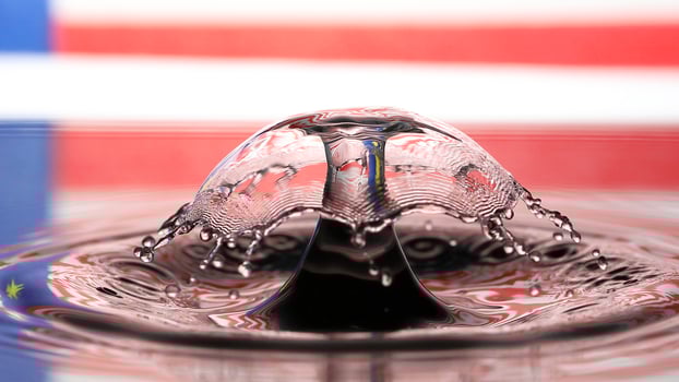 Water droplet drop splash collision dripping pillar Malaysia Flag reflection refraction independence country patriot photo