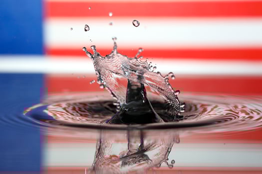 Water droplet drop splash collision dripping pillar Malaysia Flag reflection refraction independence country patriot photo