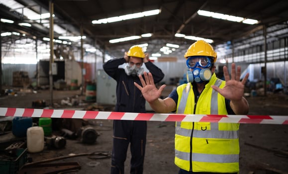 Restricted area, officials employ white and red stripes to block the area where a chemical leak is occurring. To prevent individuals from coming into contact with potentially dangerous chemicals, photo