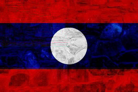 Lao People's Democratic Republic flag on a textured background. Concept collage. photo