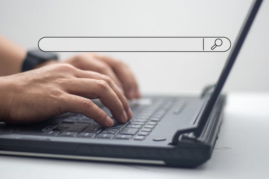 People using laptops use search box icons and copy areas to search for information on the Internet. Technical concepts photo