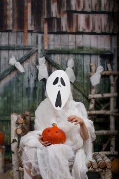 Boy of six years dressed in mummy costume. photo