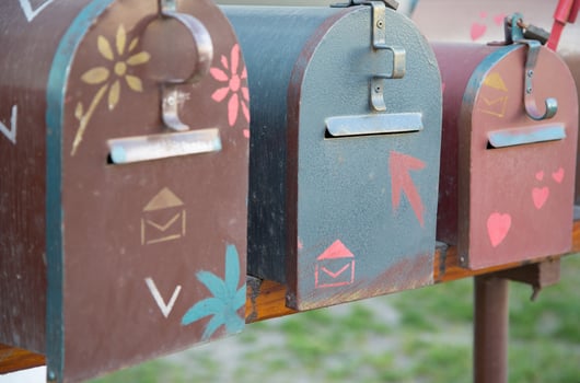 Creative metal post boxes. Closeup photo