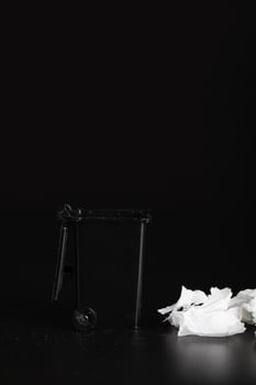 Rubbish container on a black surface. photo