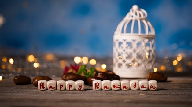 Happy ramadan word on wooden cube photo