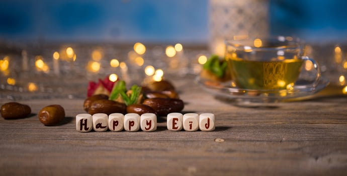 Congratulation HAPPY EID composed of wooden dices photo