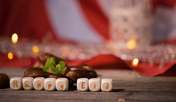 Happy eid on wooden cube photo