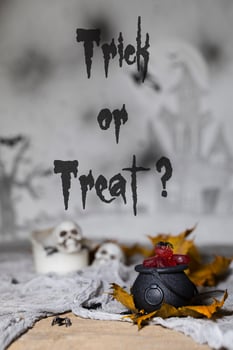 Trick or treat - Candies in cauldrons for Halloween. photo