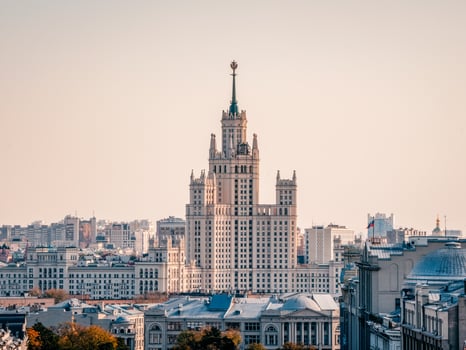 Beautiful view of Moscow. Stalinist residential building on Moscow River embankment. photo