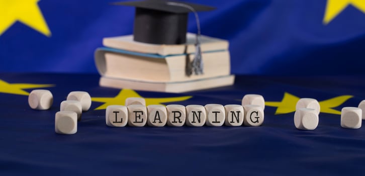 Word  LEARNING  composed of wooden letters. photo
