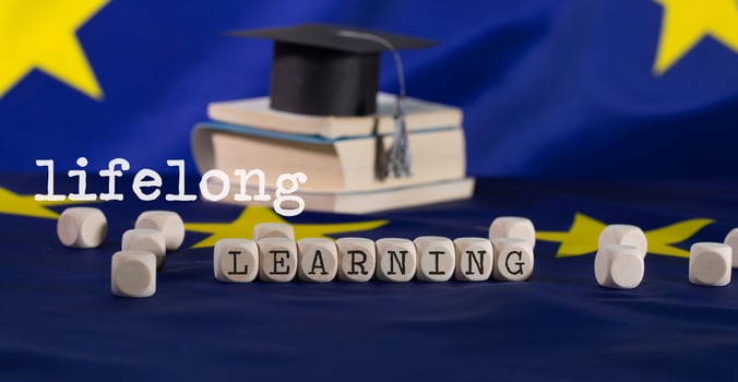 Words LIFELONG  LEARNING  composed of wooden letters. photo