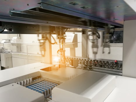 Automated robots in the medical lab photo