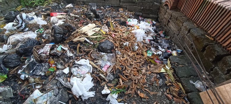 trash piled up in the dumps photo