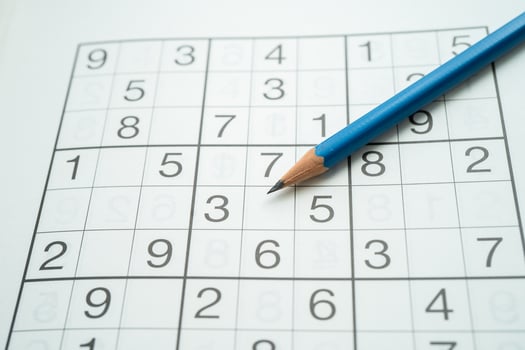 Sudoku puzzle, game to keep you brain younger for developing Alzheimer disease in senior patient. photo