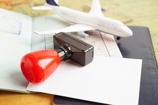 Visa and passport document to immigration at airport in country. photo