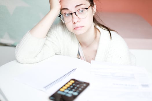 The woman was upset because of the bills. Big debts photo