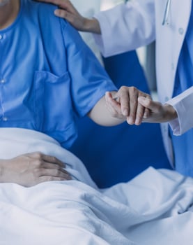 Asian caregiver doctor examine older patient use blood pressure gauge. Young woman therapist nurse at nursing home taking care of senior elderly woman sit on sofa. Medical insurance service concept photo