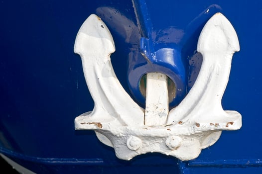 White Anchor on Blue Boat photo